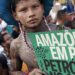 Indígenas em marcha global exigem justiça por líder Guarani Kaiowá